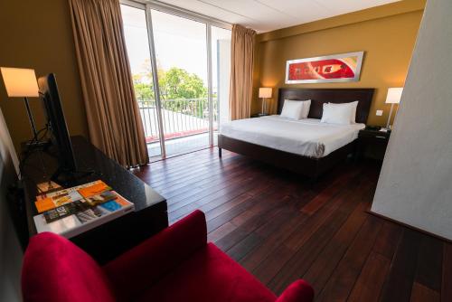 Postel nebo postele na pokoji v ubytování Radisson Hotel Paramaribo