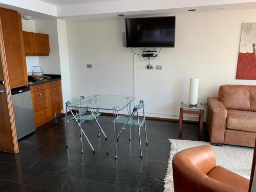 Una cocina o cocineta en Hotel Playa Grande Suites