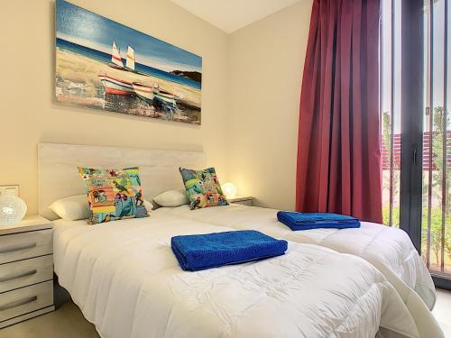 Ліжко або ліжка в номері Antilia Terraces Apartment - 1809