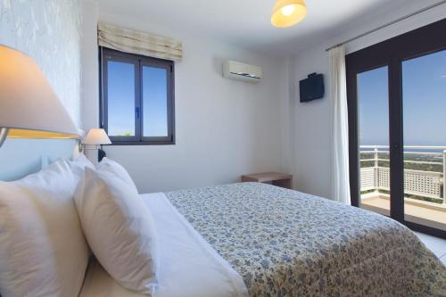 Katil atau katil-katil dalam bilik di Salvia Villas