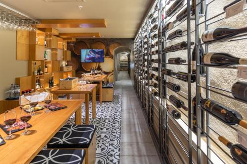 a wine tasting room with wine racks at Portugal Boutique Hotel in Lisbon