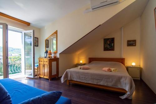 Postel nebo postele na pokoji v ubytování Apartments Mari - peaceful and quiet location