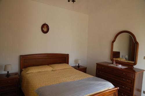 Tempat tidur dalam kamar di Il Poietto