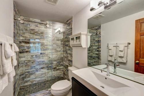 a bathroom with a sink and a toilet and a shower at Silver Jacks Condo in Breckenridge