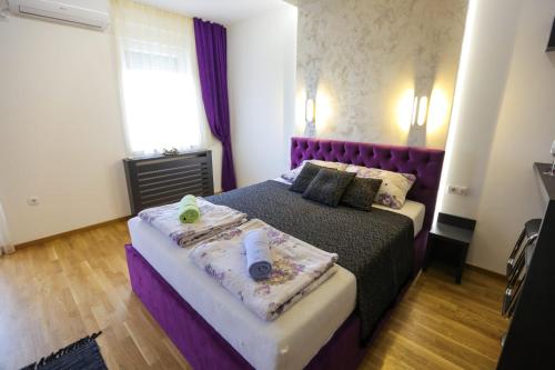 Katil atau katil-katil dalam bilik di VMAKS Apartman - Kraljev park