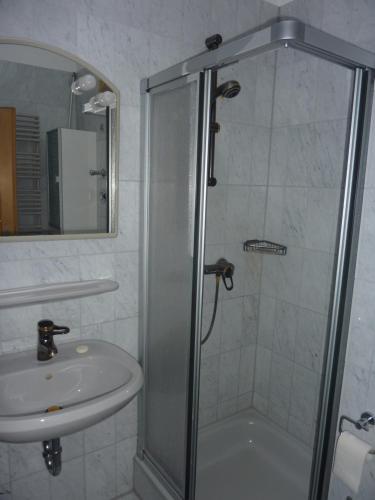a bathroom with a shower and a sink at Appartement Schuricht in Reit im Winkl