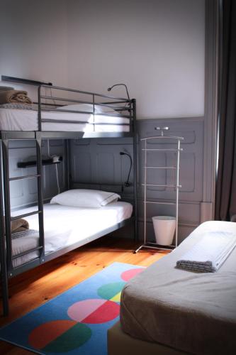 Katil atau katil-katil dalam bilik di By Doors Hostel