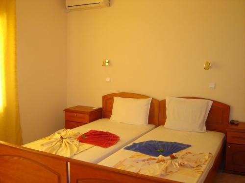 Кровать или кровати в номере Family Hotel Chris