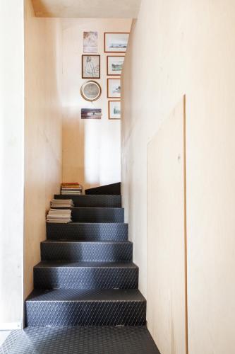 a staircase leading to the second floor of a house at Il Lavatoio in Cissano