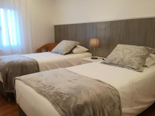 Ein Bett oder Betten in einem Zimmer der Unterkunft Casa da Levada