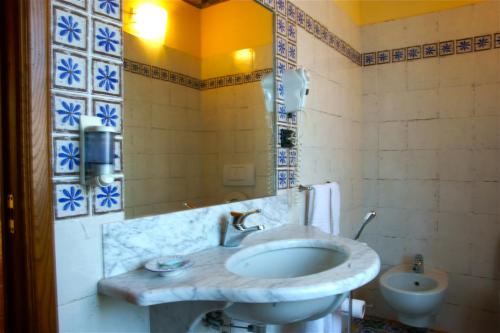 Koupelna v ubytování Locanda Ristorante Gavarini