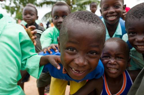a group of children posing for a picture at Tamba Kuruba Eco-lodge in Folonko