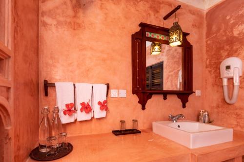Ванная комната в Kijani Hotel