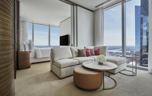 a living room filled with furniture and a view of the ocean at Four Seasons Hotel Philadelphia at Comcast Center in Philadelphia