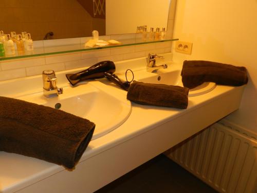 Kylpyhuone majoituspaikassa Apartment Het Blekershuys