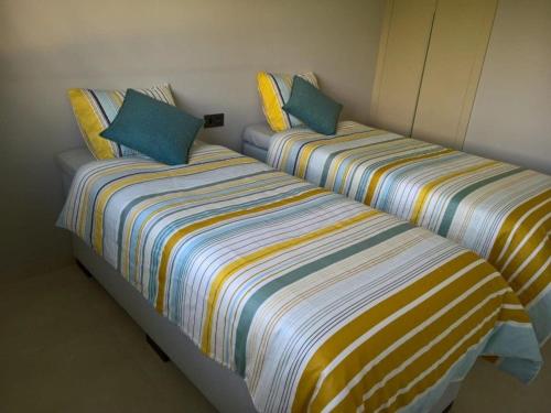 Posteľ alebo postele v izbe v ubytovaní Oasis Beach X 106