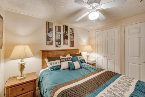 a bedroom with a bed and a ceiling fan at Stroll to Slopes, Village Area, Ski in-out MtLodge 329 in Snowshoe