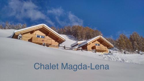 a log cabin in the snow at Chalet Magda-Lena in Heiligenblut