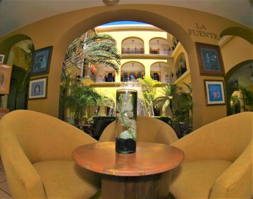 Χώρος καθιστικού στο Hotel America