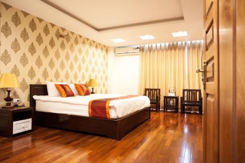 Cama o camas de una habitación en Mely Hotel Hà Nội