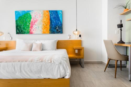 Katil atau katil-katil dalam bilik di Opal Suites Apartments