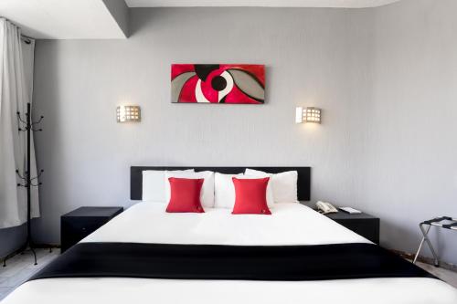 Una cama o camas en una habitación de Guadalajara Express Tonala