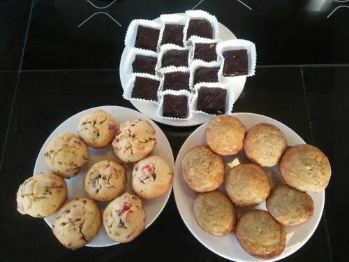 two plates of muffins and a waffle at Bella Villa Coron in Coron