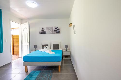 Postel nebo postele na pokoji v ubytování Le paradis caché de Phedre