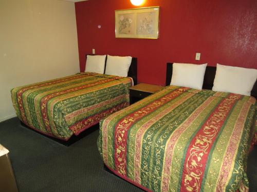 Katil atau katil-katil dalam bilik di Calico Motel
