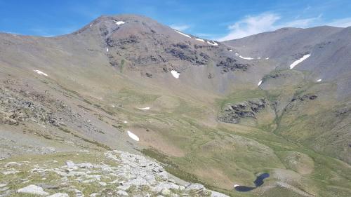 an aerial view of a mountain with snow on it at Masia Can Constans in Queralbs