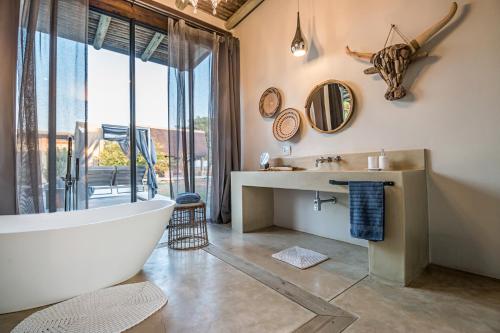 Koupelna v ubytování Kruger Sunset Lodge