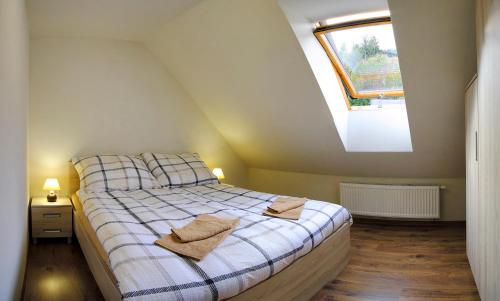 Katil atau katil-katil dalam bilik di Apartmány Pemmeva