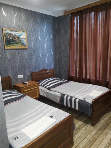 Postel nebo postele na pokoji v ubytování Hotel E U R O P E