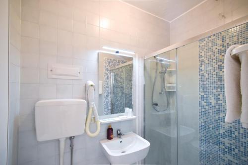 Koupelna v ubytování Hotel Janeiro