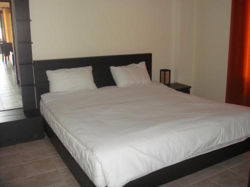 Ein Bett oder Betten in einem Zimmer der Unterkunft Baan Sawan Resort