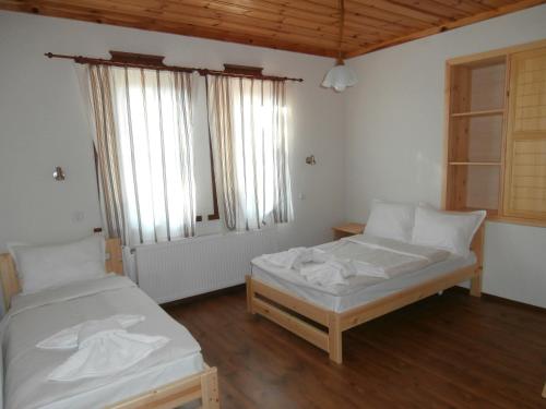 Lova arba lovos apgyvendinimo įstaigoje Hotel Mitnitsa and TKZS Biliantsi