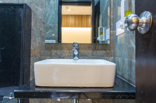 Koupelna v ubytování Rupam Hotel