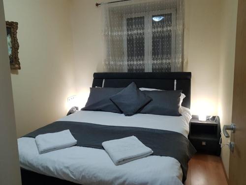 Ένα ή περισσότερα κρεβάτια σε δωμάτιο στο Casa frumoasă