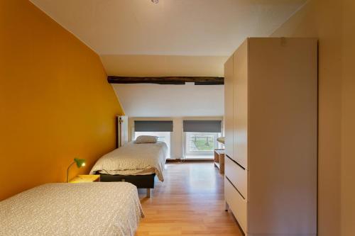 Un pat sau paturi într-o cameră la 't Verderf