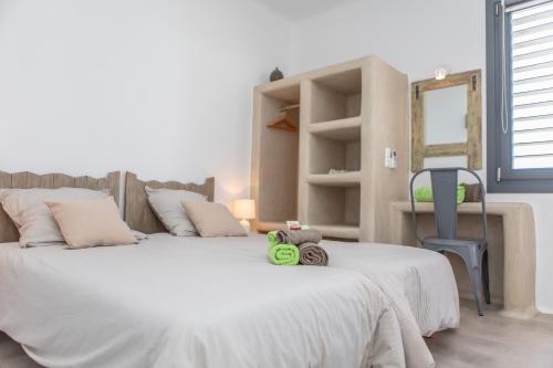 Postel nebo postele na pokoji v ubytování Mikri Villas