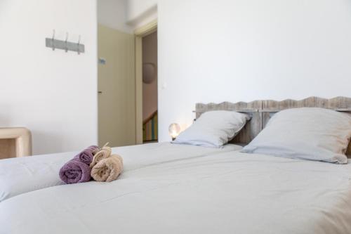 Postel nebo postele na pokoji v ubytování Mikri Villas