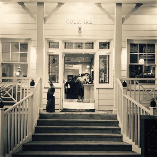 a woman walking down the stairs of a store at 19 Ocean Gate in Newquay