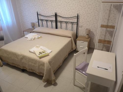 Ένα ή περισσότερα κρεβάτια σε δωμάτιο στο B&B Mariele