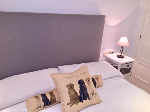 Ένα ή περισσότερα κρεβάτια σε δωμάτιο στο Casa Modernista "La Trinidad"