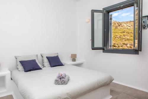 Postel nebo postele na pokoji v ubytování Mikri Villas