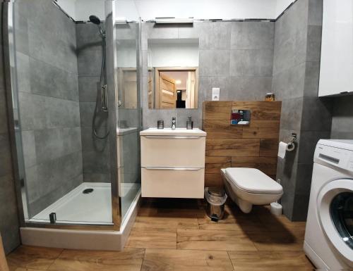 Kúpeľňa v ubytovaní GM Apartament Szczecin