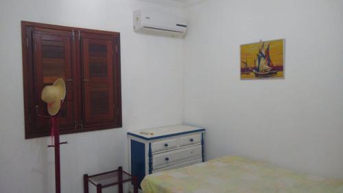 Cama ou camas em um quarto em Excelente casa em Tamandare