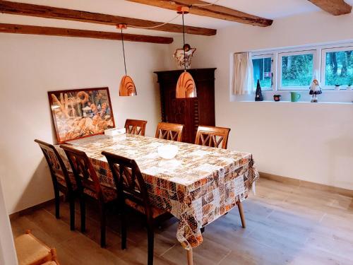 a dining room with a table and chairs at Koege Guesthouse in Køge