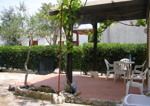 Сад в Casa a Villaggio Paradiso