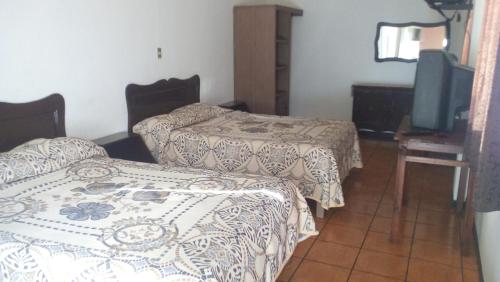 Postel nebo postele na pokoji v ubytování Casa Celia